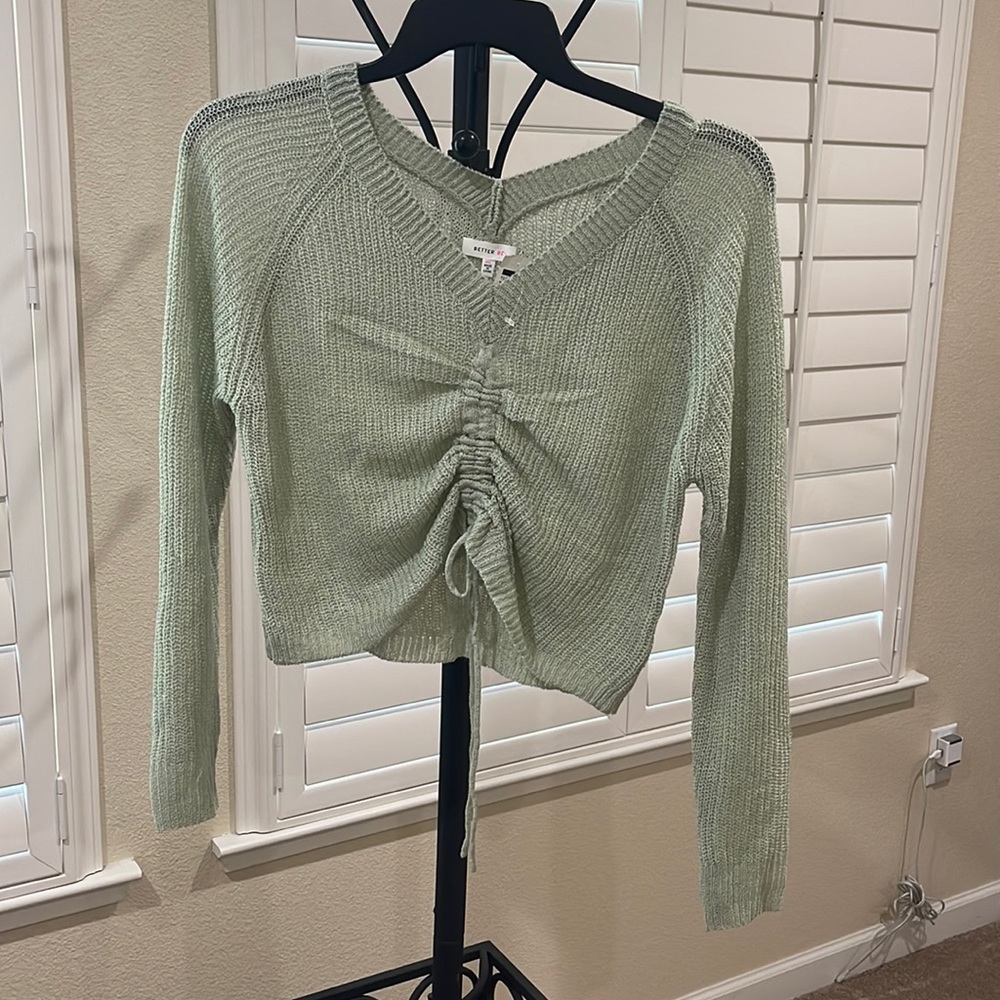Green long sleeved ruched top